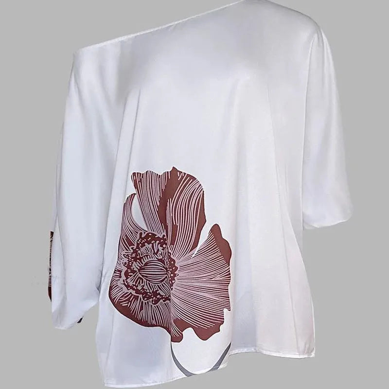 White printed top and straight-leg pants casual fashion set on model