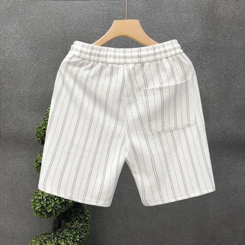 Men's black and white striped fleece-lined casual shorts with an elasticated waistband.