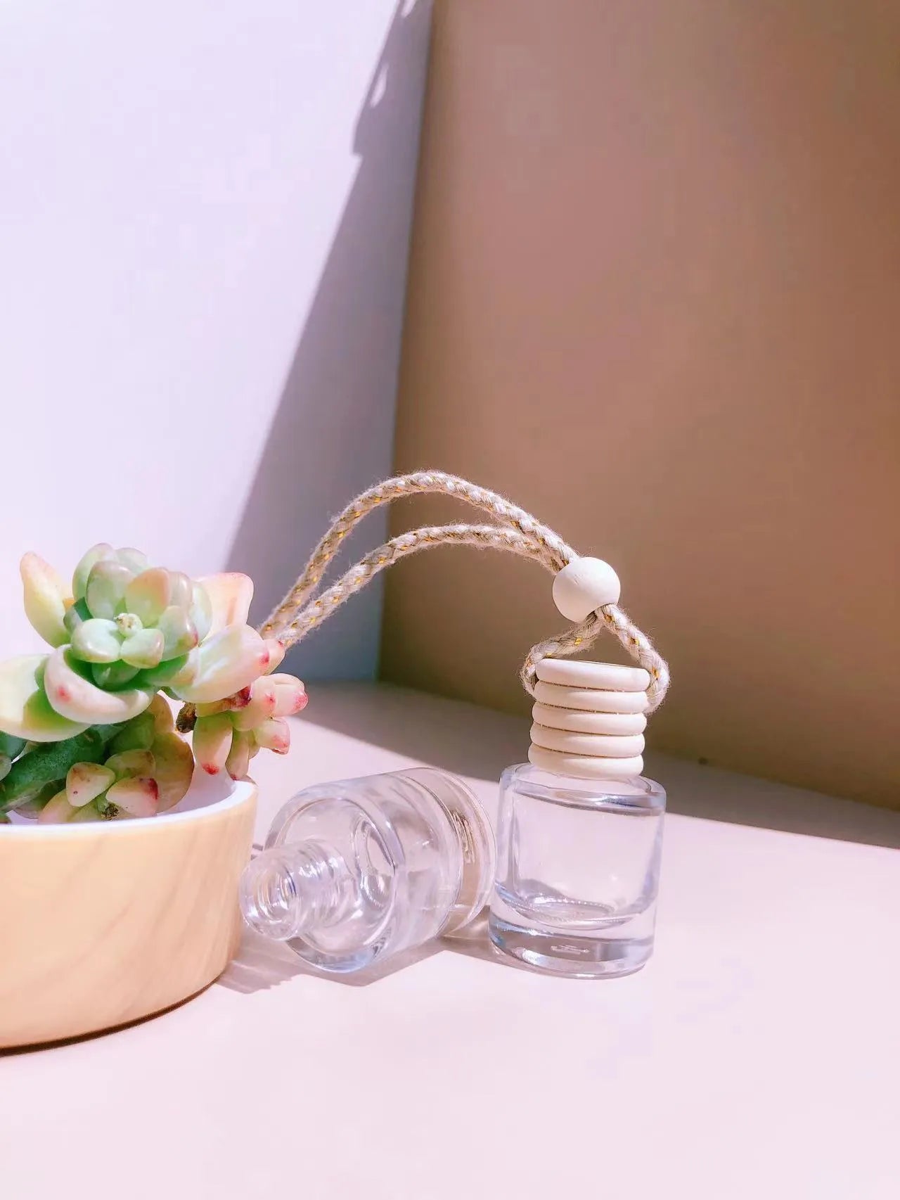 Glass car perfume pendant fragrance bottle in cylinder, diamond, flat drum, and square shapes