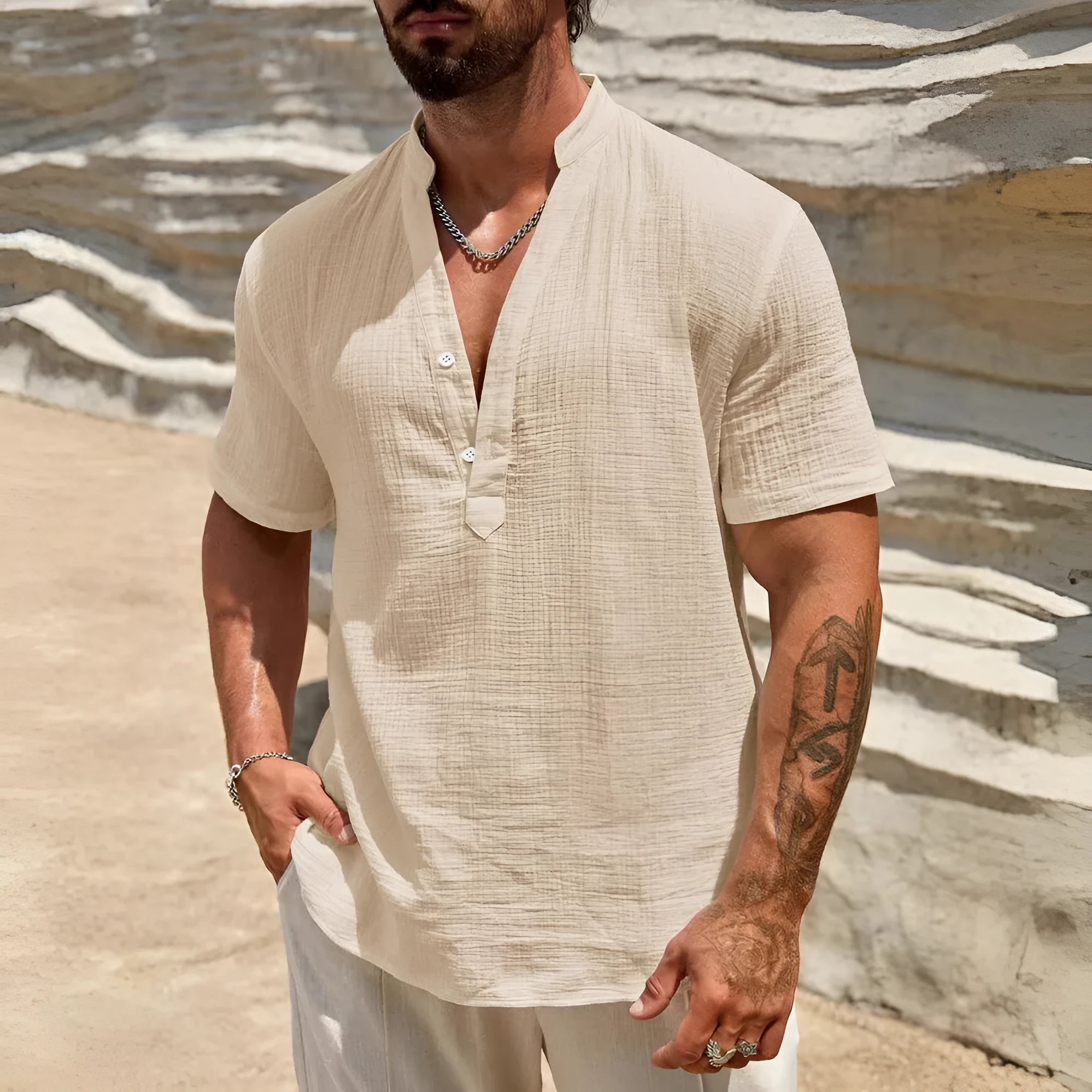 Men's solid colour short-sleeved shirt with a stand collar, shown in a casual style.