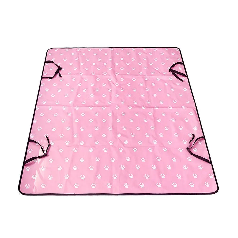 Grey car pet mat with dog bone print covering a vehicle's rear seat.