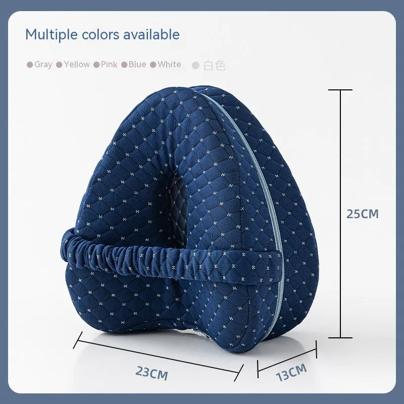 Love heart shaped memory foam leg pillow in dark blue jacquard fabric, shown next to a tape measure indicating 25x23x13 cm dimensions.