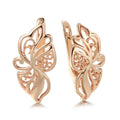 Rose gold geometric earrings for women with hollow carved copper design and rhinestone accents, one pair