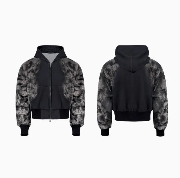 Three-piece streetwear clothing set showing printed hoodie, loose trousers, and shorts with collage stitching detail.