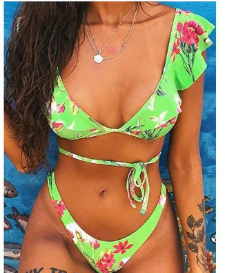 Yellow floral split print bikini swimsuit with triangle top on mannequin
