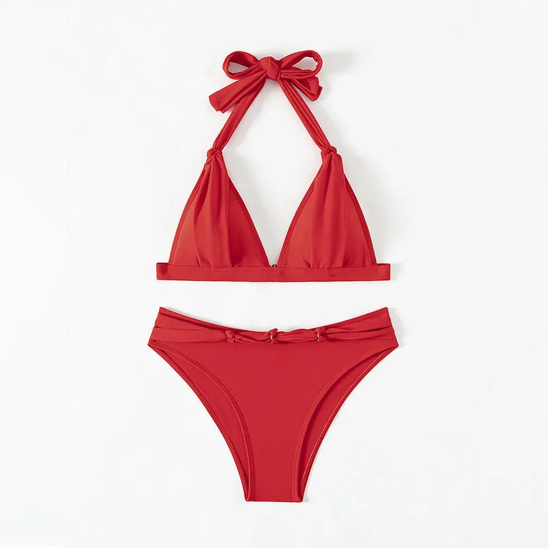 Red women's lace-up halterneck bikini set with split beach style shorts