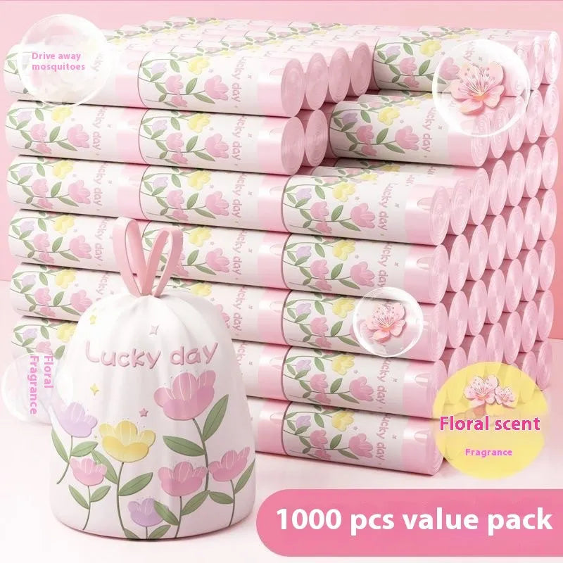 Pink degradable drawstring bin bags with argy wormwood for mosquito repellent, size 44cm by 48cm.