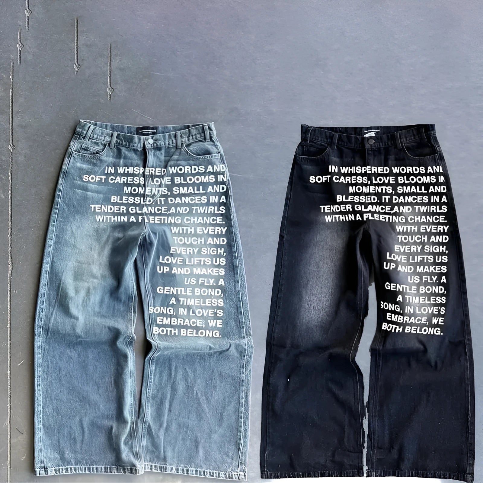 Men's black and blue cotton wide-leg straight casual trousers on a hanger, showing loose fit