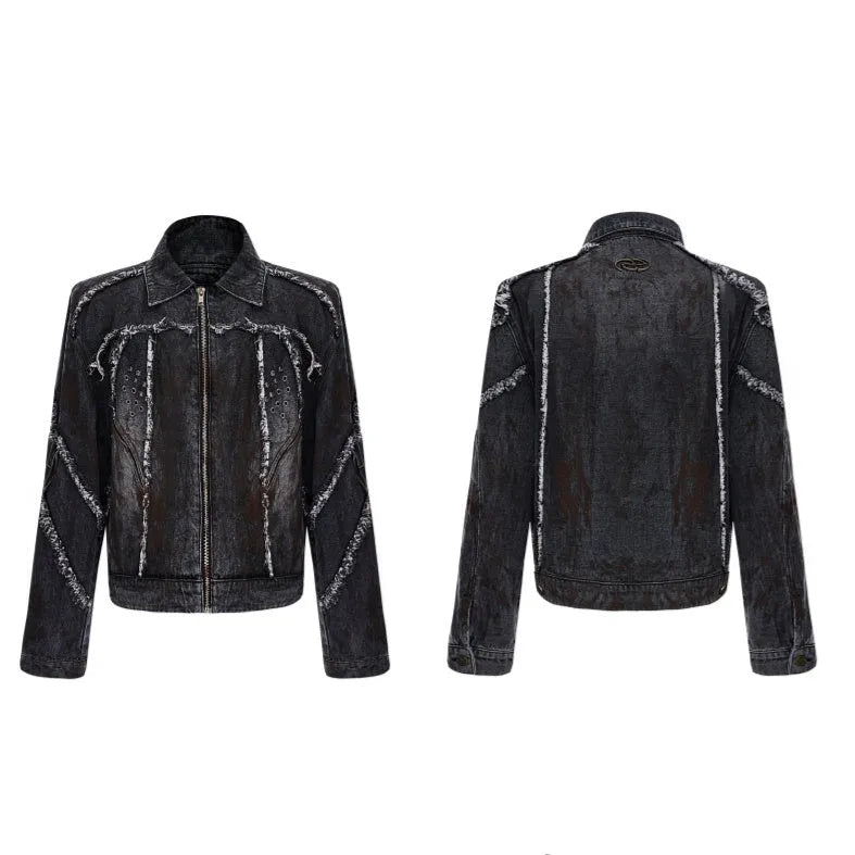 Black raw edge splash-dye distressed denim coat with padded shoulders and matching pants laid flat.