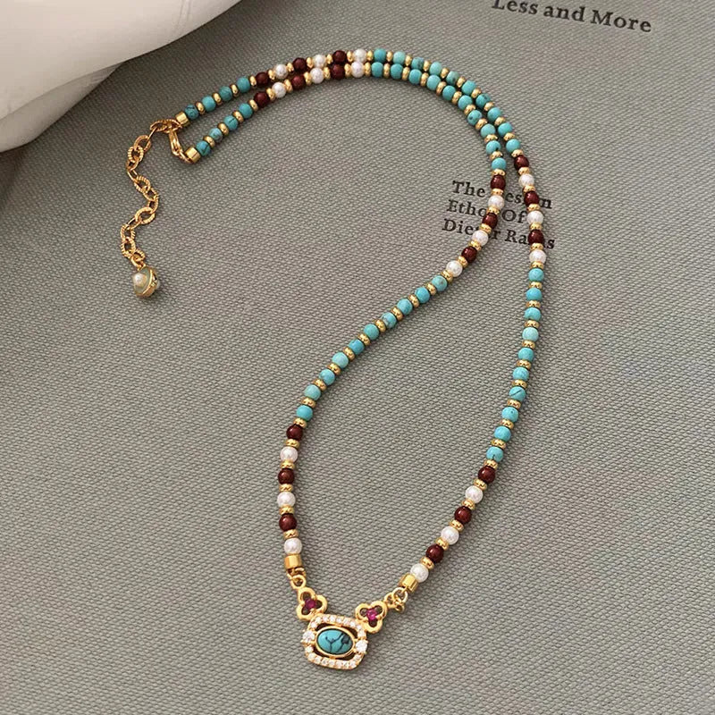 Natural turquoise pearl necklace on copper base with real gold plating, geometric pendant, French retro style, clavicle length for women