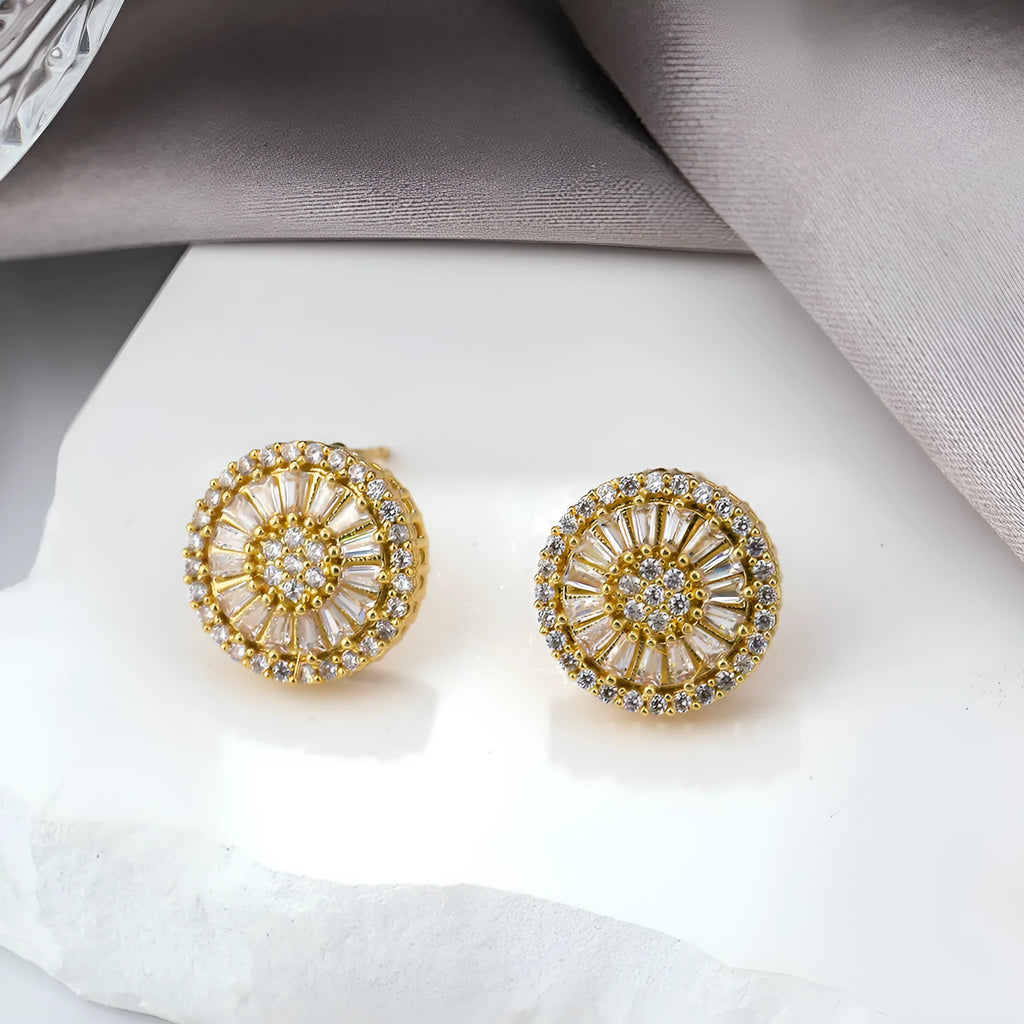 A pair of INS-style geometric earrings with a round pattern design in electroplated E160 gold colour.