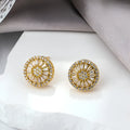 A pair of INS-style geometric earrings with a round pattern design in electroplated E160 gold colour.