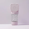 Green 3-in-1 portable pet water bottle with food container, waste bag dispenser, and carrying strap.
