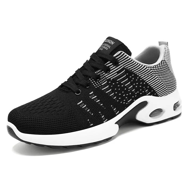 Men's low-top Flyknit mesh sneakers in black and grey colourway with lace-up front