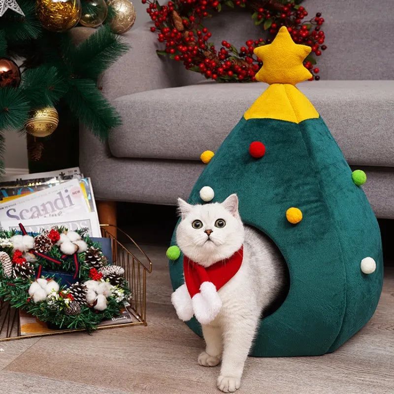 Red Christmas tree shaped plush cave bed for cats and small dogs on a wooden floor