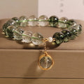 Green phantom quartz and chorite crystal bracelet with winding transfer beads