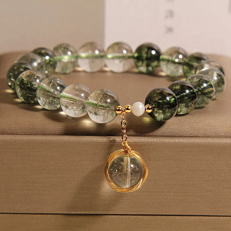 Green phantom quartz and chorite crystal bracelet with winding transfer beads