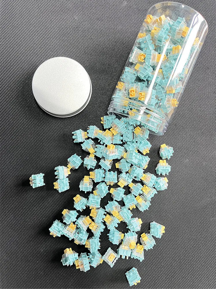 36 Sea Salt Lemon PRO Mute tactile keyboard switches for mechanical keyboards on a white background.