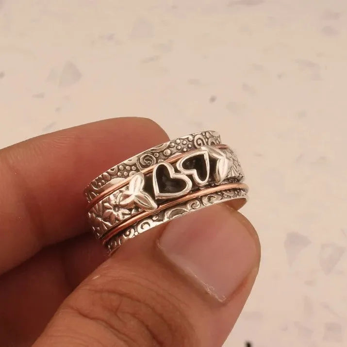 Silver women's personality love wide noodle ring on white background, size option visible
