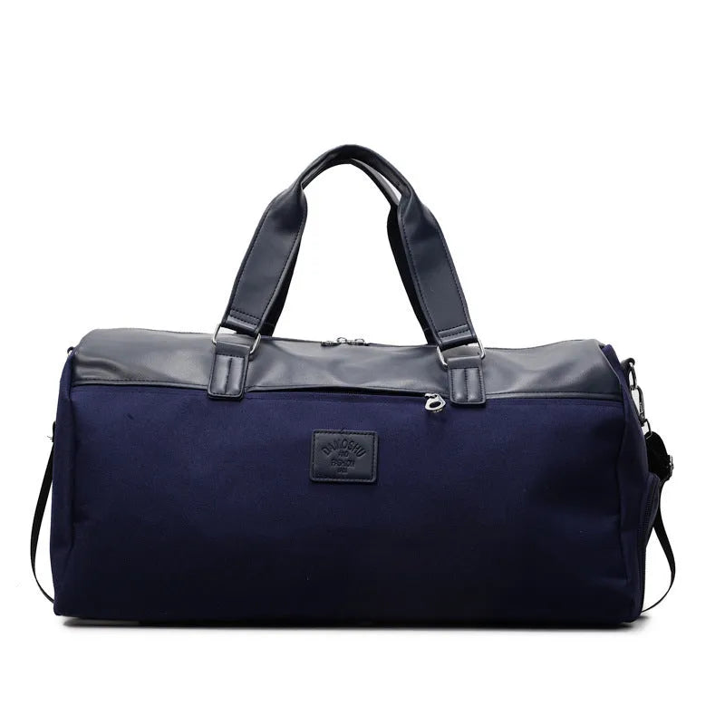 Black Oxford cloth large capacity messenger bag with a top handle and adjustable shoulder strap.