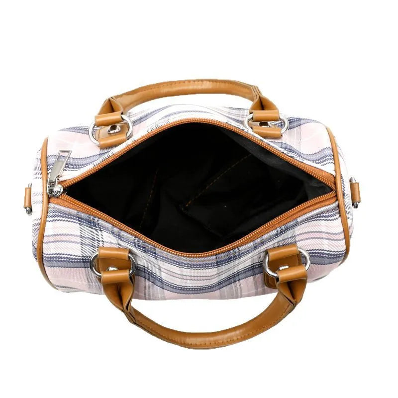 Plaid academy style round barrel canvas shoulder bag with three-dimensional pocket, available in blue plaid.