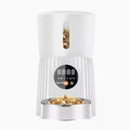 Black automatic pet feeder with digital LCD screen and large food container.