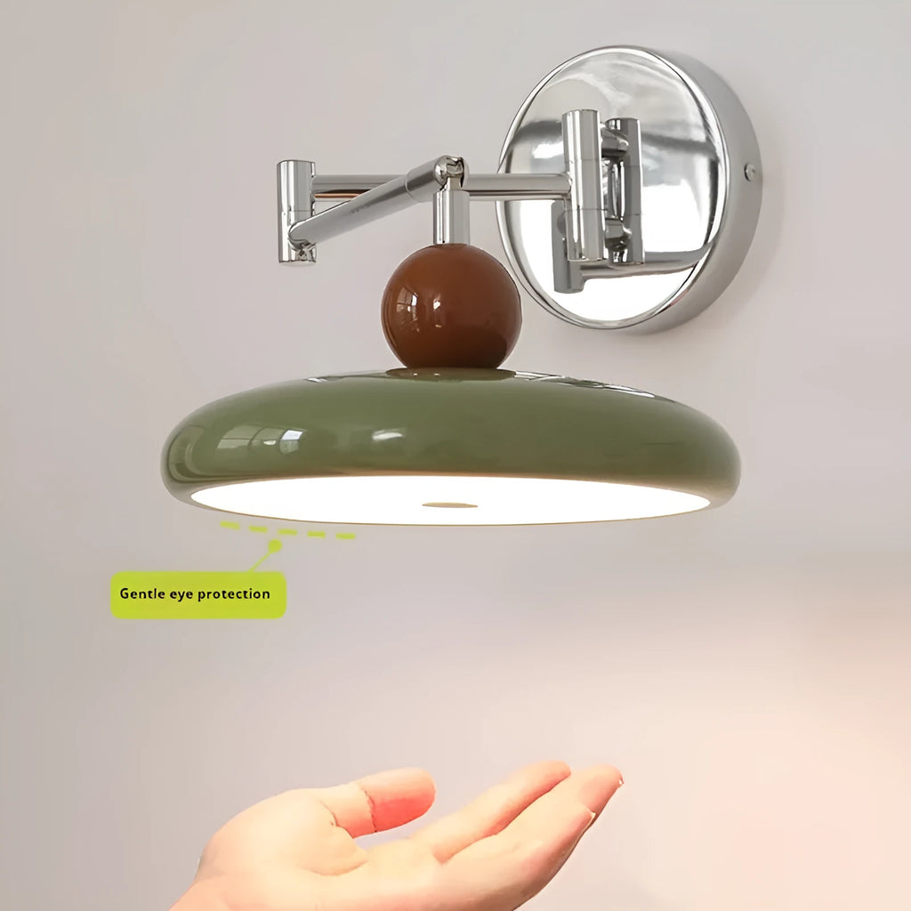 Antique style camera arm wall lamp in black finish with three colour temperature settings