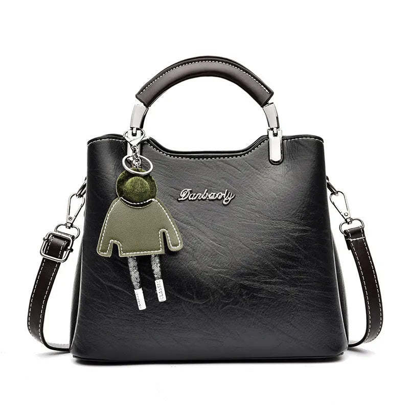 Simple Retro small horizontal square PU crossbody handbag for women in black with outer slit pocket