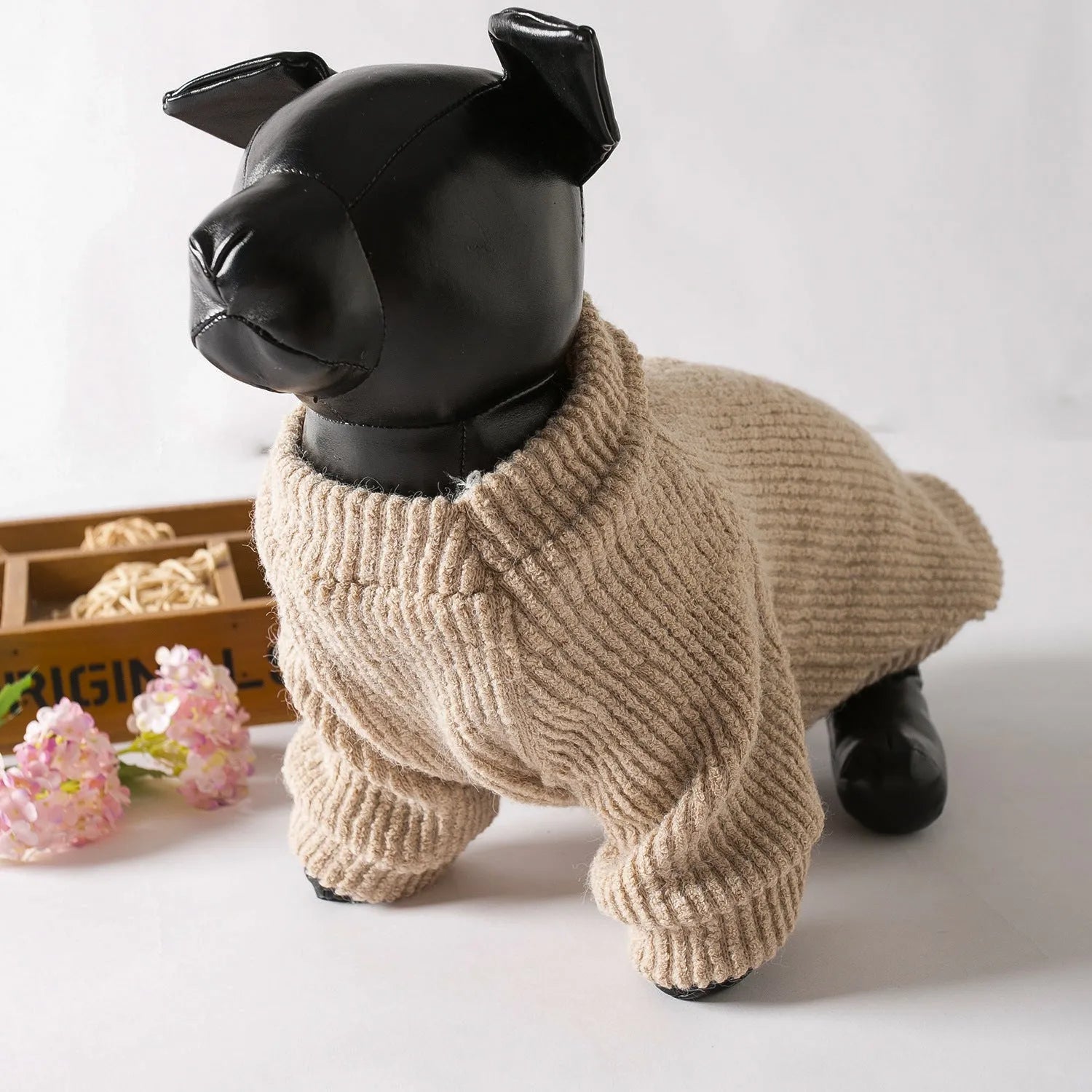 Brown knitted cloth sweater pullover on a small dog, showing casual style.