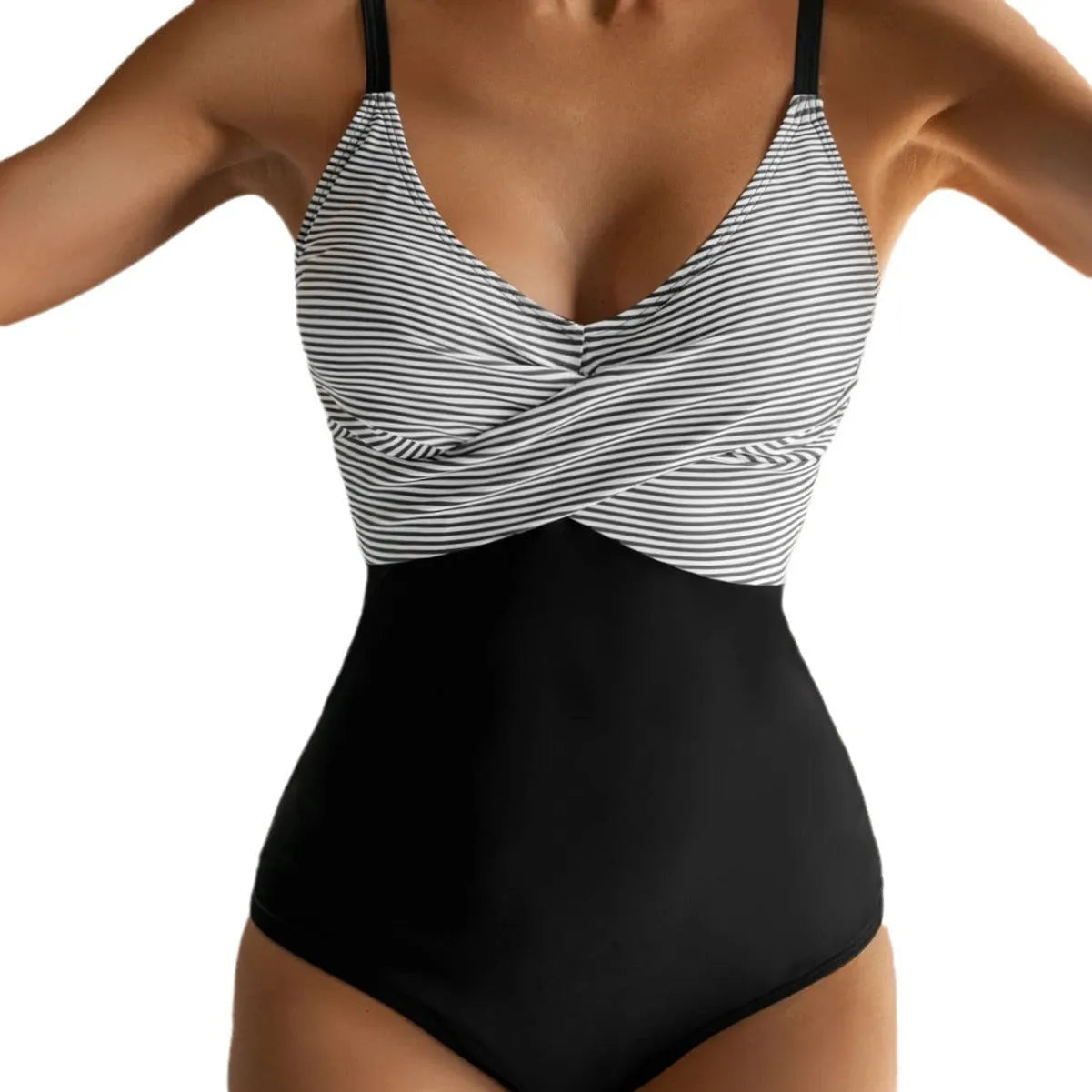 Female model wearing a printed lace-up backless bikini swimsuit in a floral pattern.