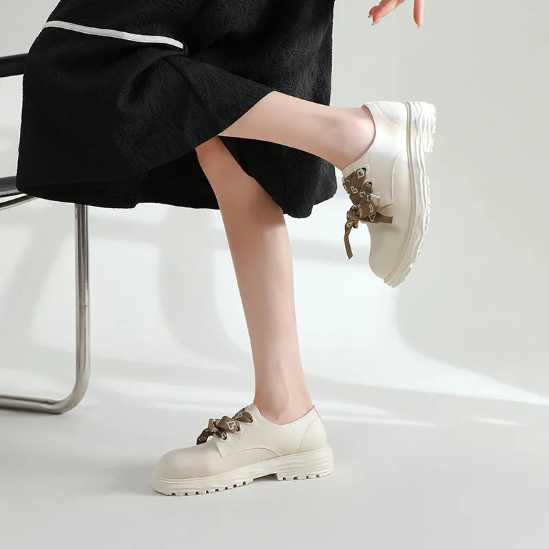 Women's thick bottom chunky heel mid-top rain boots in solid colour with PVC upper and injection moulded sole