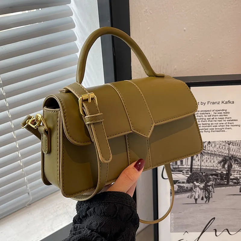 Women's horizontal square messenger bag in PU material with internal file organisation