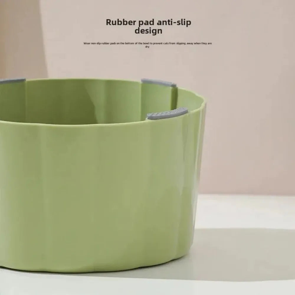 Solid green ceramic cat bowl with cactus pattern, high sides, and anti-slip rubber base ring.