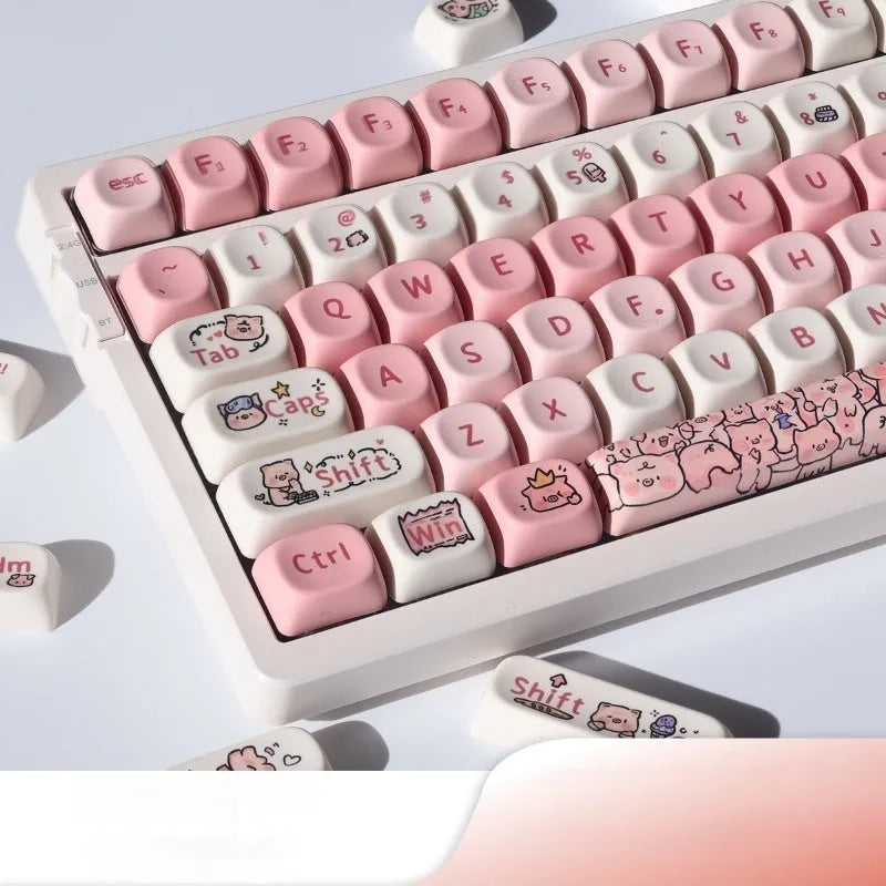 Pink PBT keycap set with 3D sublimation pig design and keycap puller.