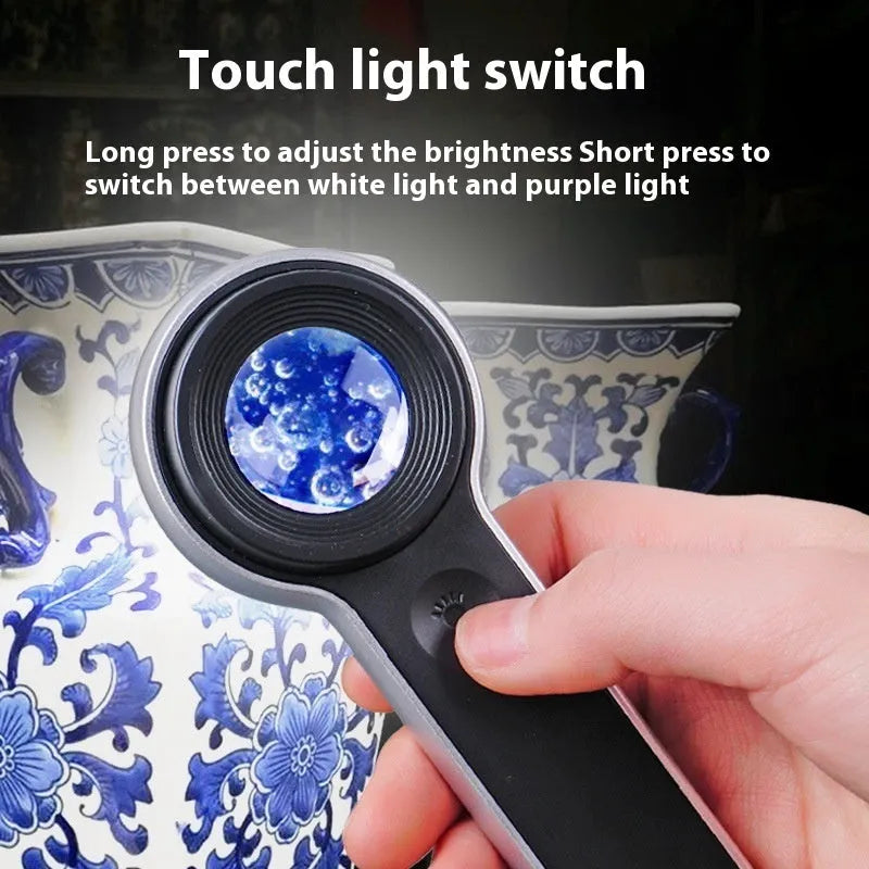60x HD LED magnifying glass with USB charging in silver, showing illuminated lens and compact handheld design