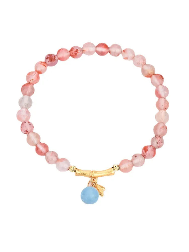 Agate bracelet with flower design and bamboo joint elements featuring Nanhong ice float gemstone