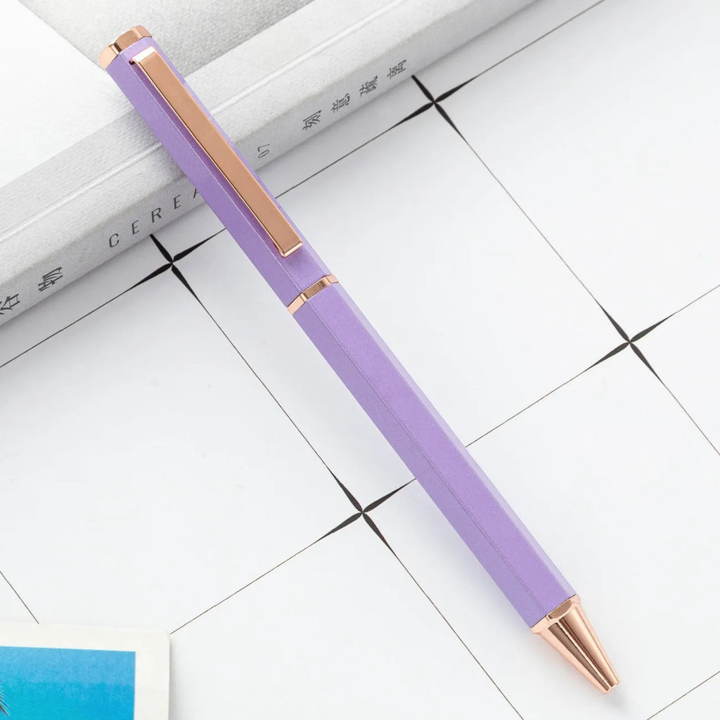Metal six-angle ballpoint pen in black with 1.0mm bullet tip on white surface