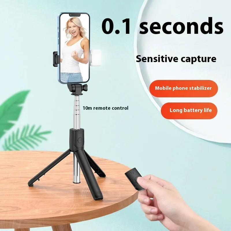 Mobile phone Bluetooth selfie stick tripod with self timer extended to 70cm on a white background in black colour