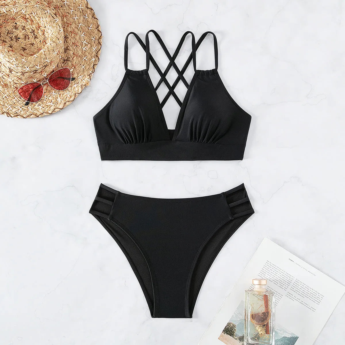 Women's halter bikini swimsuit with V-neck and adjustable straps in a solid colour.