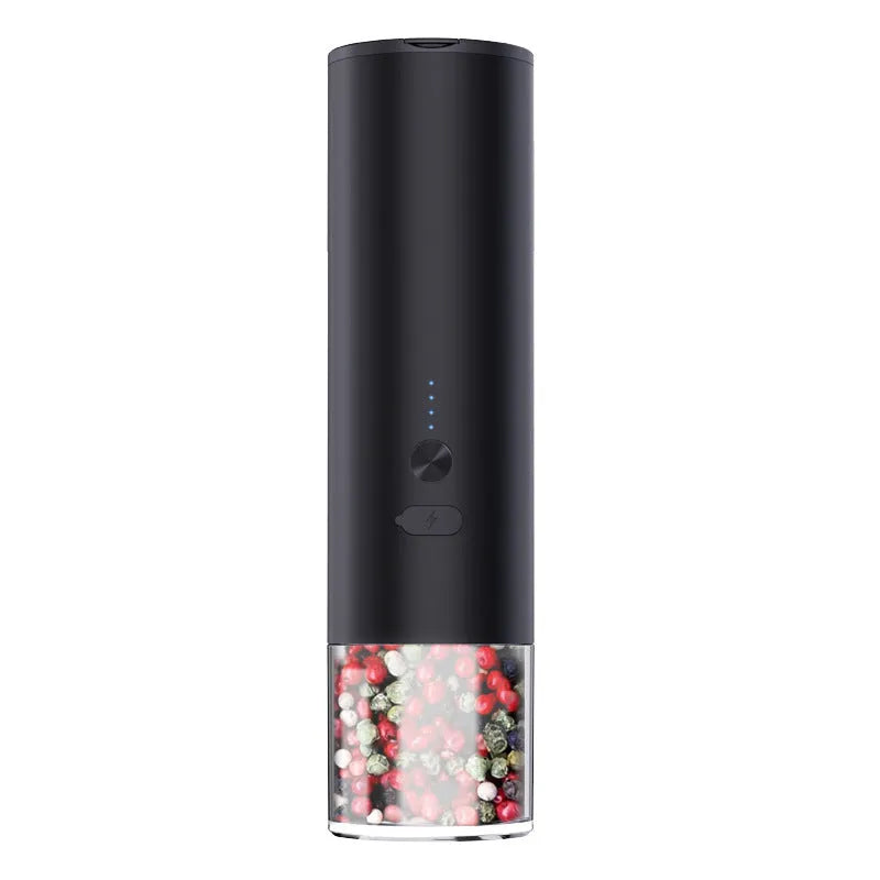 White electric salt and pepper grinder set with clear glass jar and stainless steel top on kitchen counter