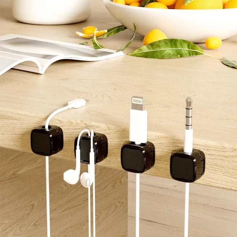 White and black magnetic cable clips for under desk cable management with 2kg capacity