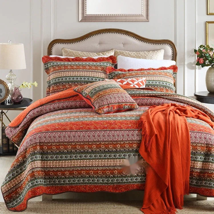 Pure cotton bedspread and pillowcase set in a patterned design on a bed.
