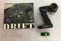 Blue Turbo Racing C64 gyro drift RC car with proportional remote control on a track
