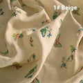 Pure ramie fabric swatch in beige, dark green, and grass green colours showing texture.
