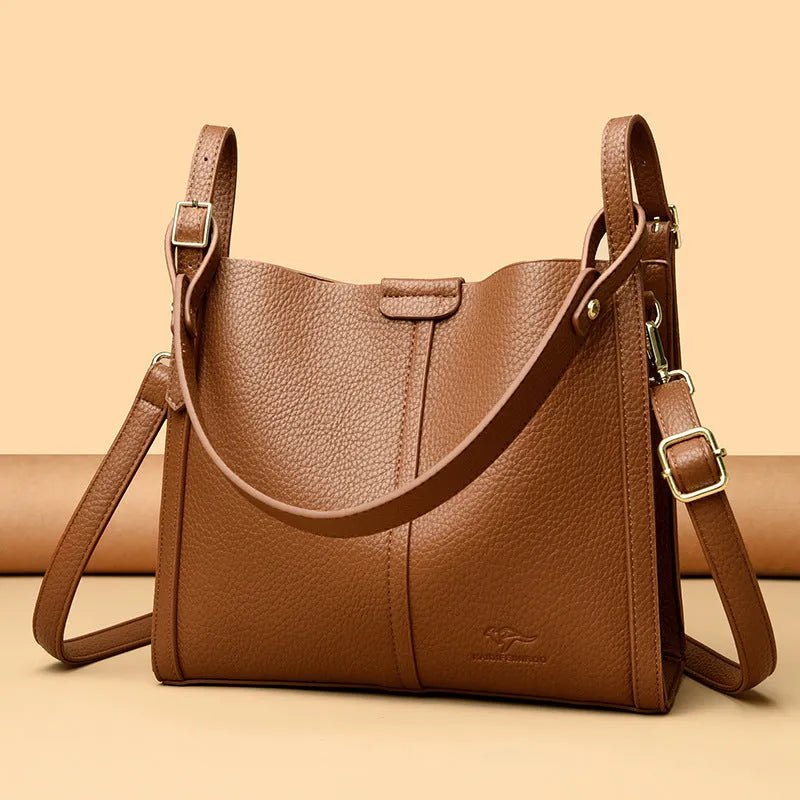 Ladies retro shoulder bag in vertical square shape showing PU material construction and internal compartments