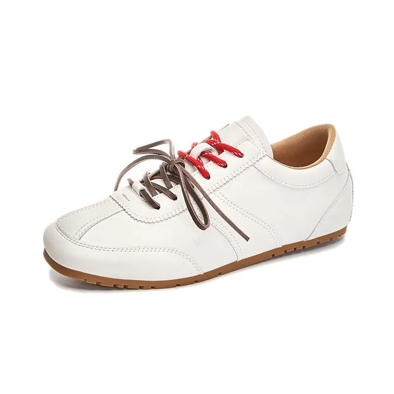 Women's white flat lace-up shoes with decorative horsehair flocking on the upper and a round toe.