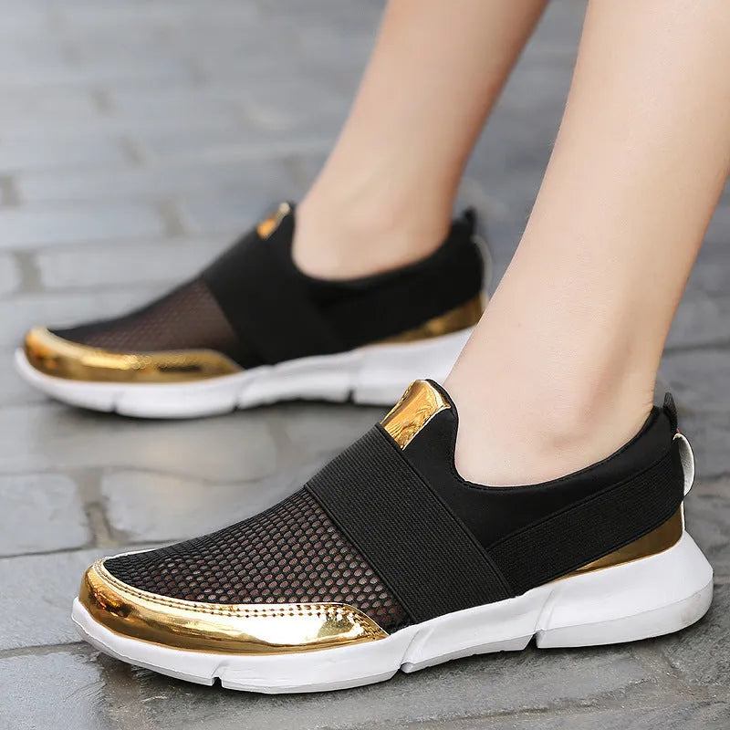 Women's low-top casual sneakers in blue, featuring a mesh upper and a lightweight design.