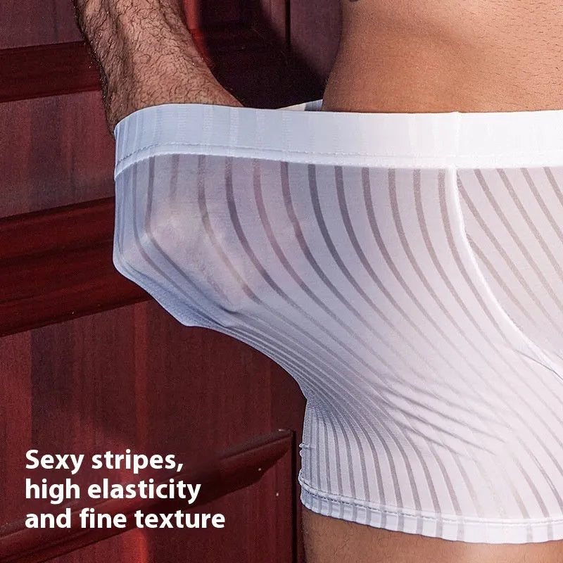 Men's black striped nylon boxer briefs laid flat, showing elastic waistband and vertical stitch detail.