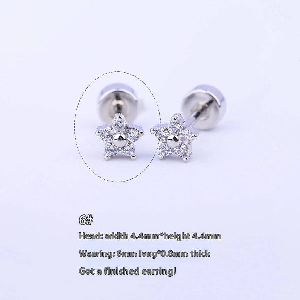 Copper-plated gold micro inlaid zircon five-petal plum flower ear studs on a white background, unisex design, real gold thick plating
