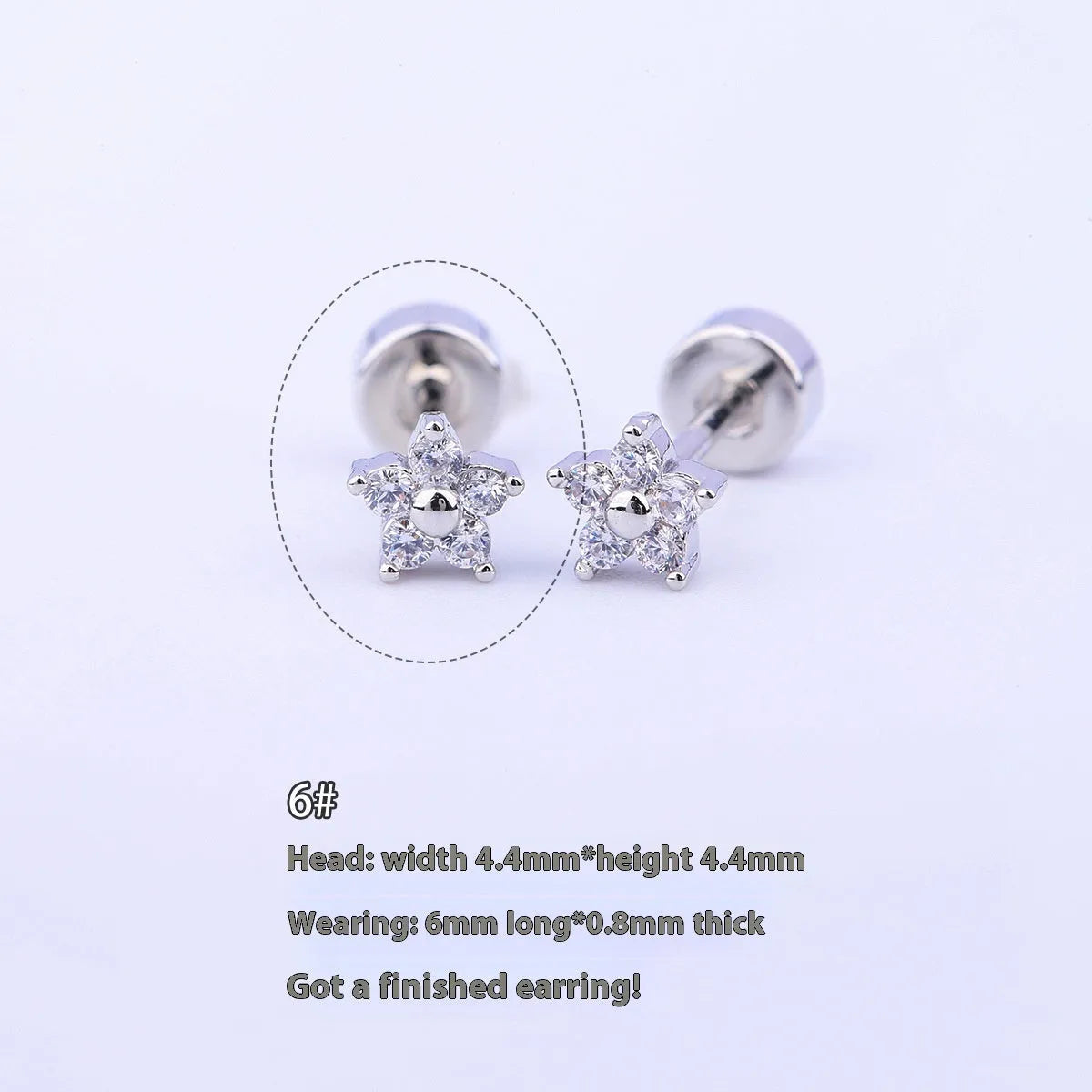 Copper-plated gold micro inlaid zircon five-petal plum flower ear studs on a white background, unisex design, real gold thick plating